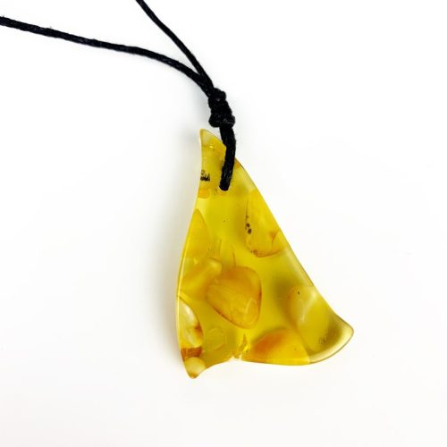 Natural Baltic amber pendant — choosing a single stone to wear every day, handcrafted in Brooklyn USA by KIZIMA