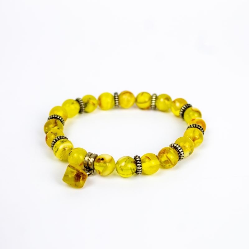 Natural Baltic amber bead bracelet with pendant — amber jewelry guide from necklace to brooch, handcrafted in Brooklyn USA by KIZIMA