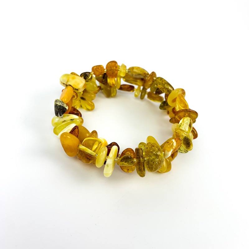Multicolor natural Baltic amber spiral bracelet — the colors of amber from honey to cherry, handcrafted in Brooklyn USA by KIZIMA