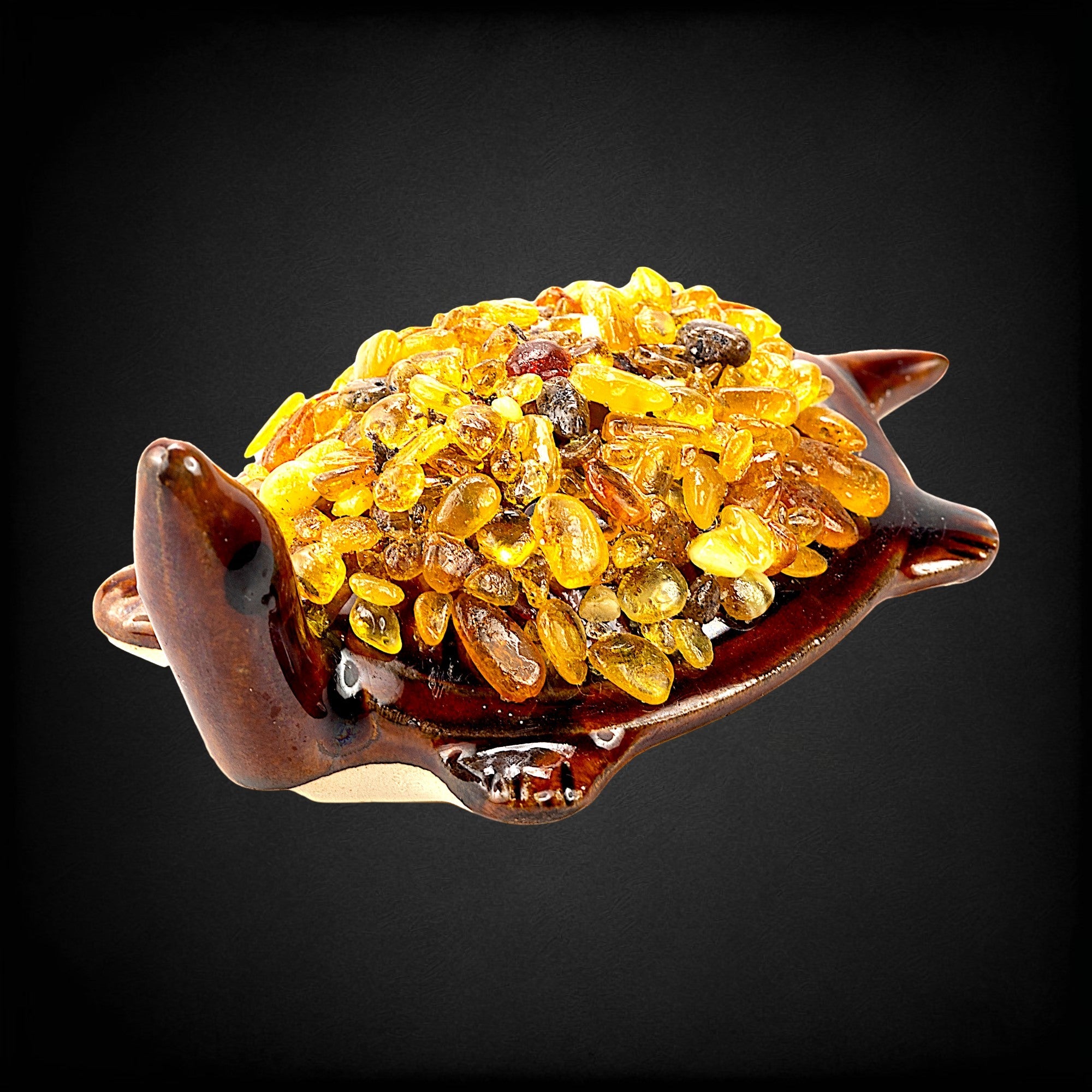 Souvenir Baltic amber turtle figurine by KIZIMA® — genuine amber, handmade in USA, side angle