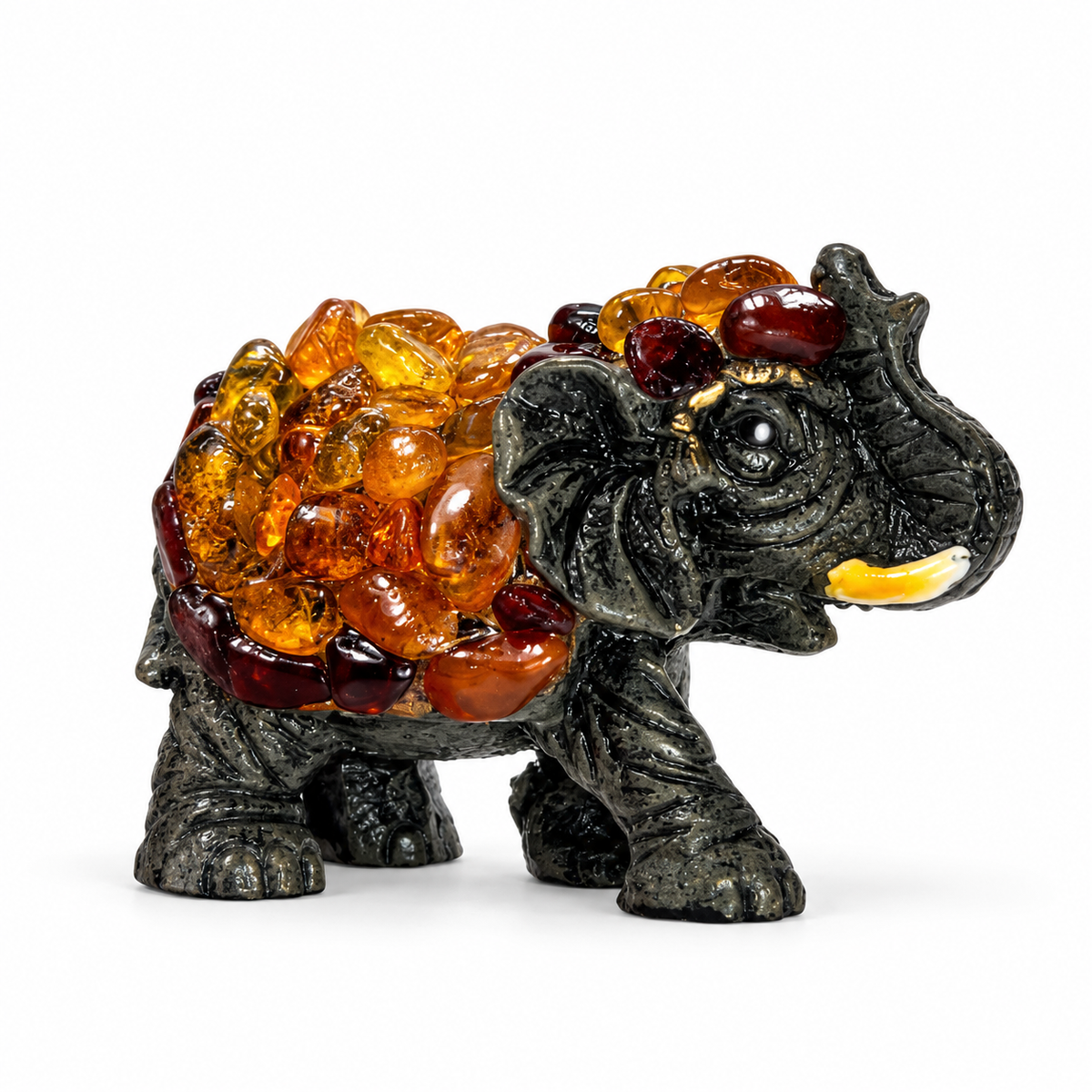 Natural Baltic Amber success elephant figurine size S by KIZIMA®, white background, feng shui lucky elephant with raised trunk