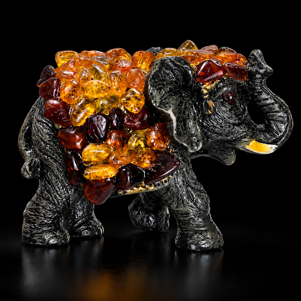 Made in USA Natural Baltic Amber success elephant figurine size M, trunk up, honey and cognac amber mosaic, black studio background — KIZIMA®