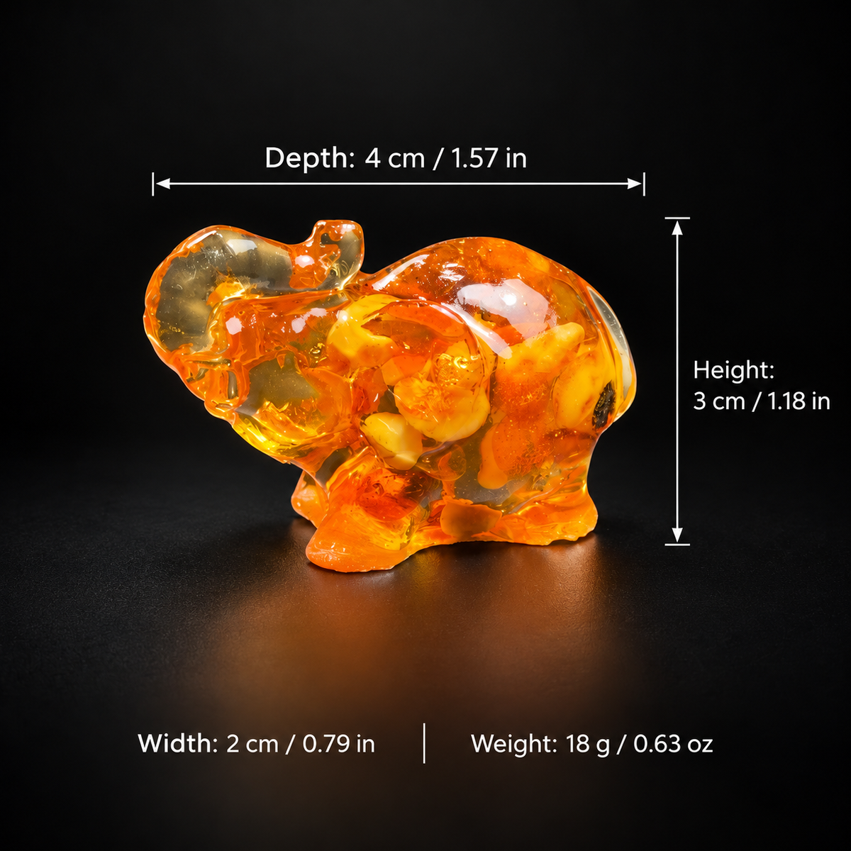 Size chart: KIZIMA® Baltic amber mini elephant, H 3 cm / 1.18 in, D 4 cm / 1.57 in, W 2 cm / 0.79 in, 18 g / 0.63 oz