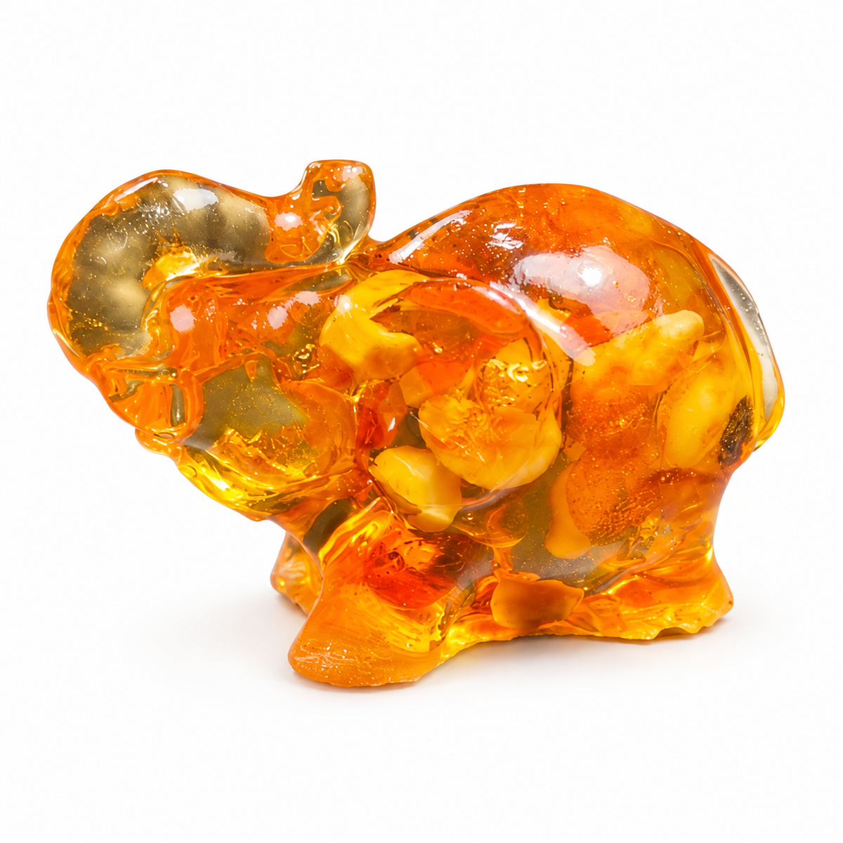 Natural Baltic Amber mini elephant figurine by KIZIMA®, white background — tiny lucky elephant gift