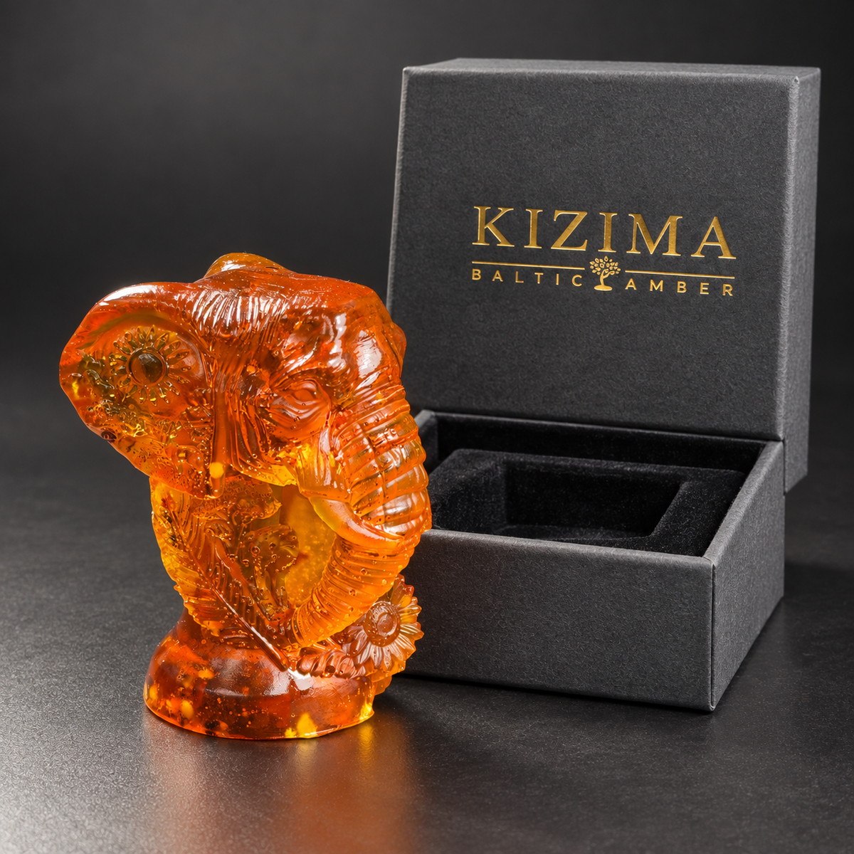 Baltic amber Ganesha head statue with KIZIMA® gift packaging — ready-to-give spiritual gift