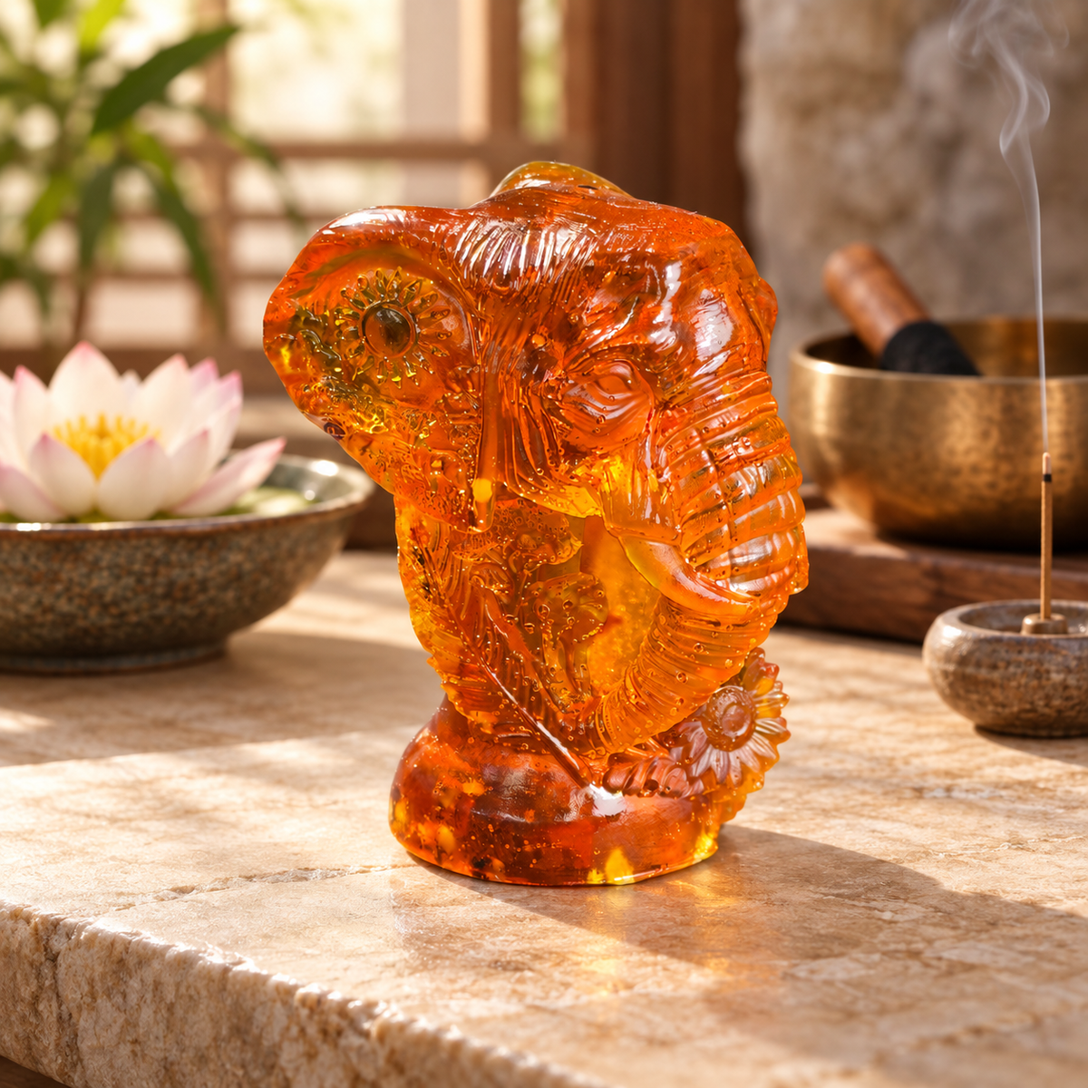 Baltic amber Ganesha head statue in a meditation space — amber altar decor by KIZIMA®