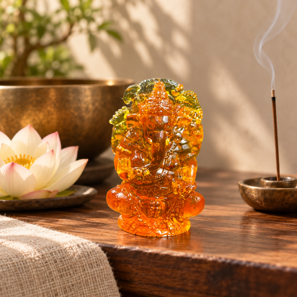 Baltic amber Ganesha statue in a meditation space — amber altar decor by KIZIMA®