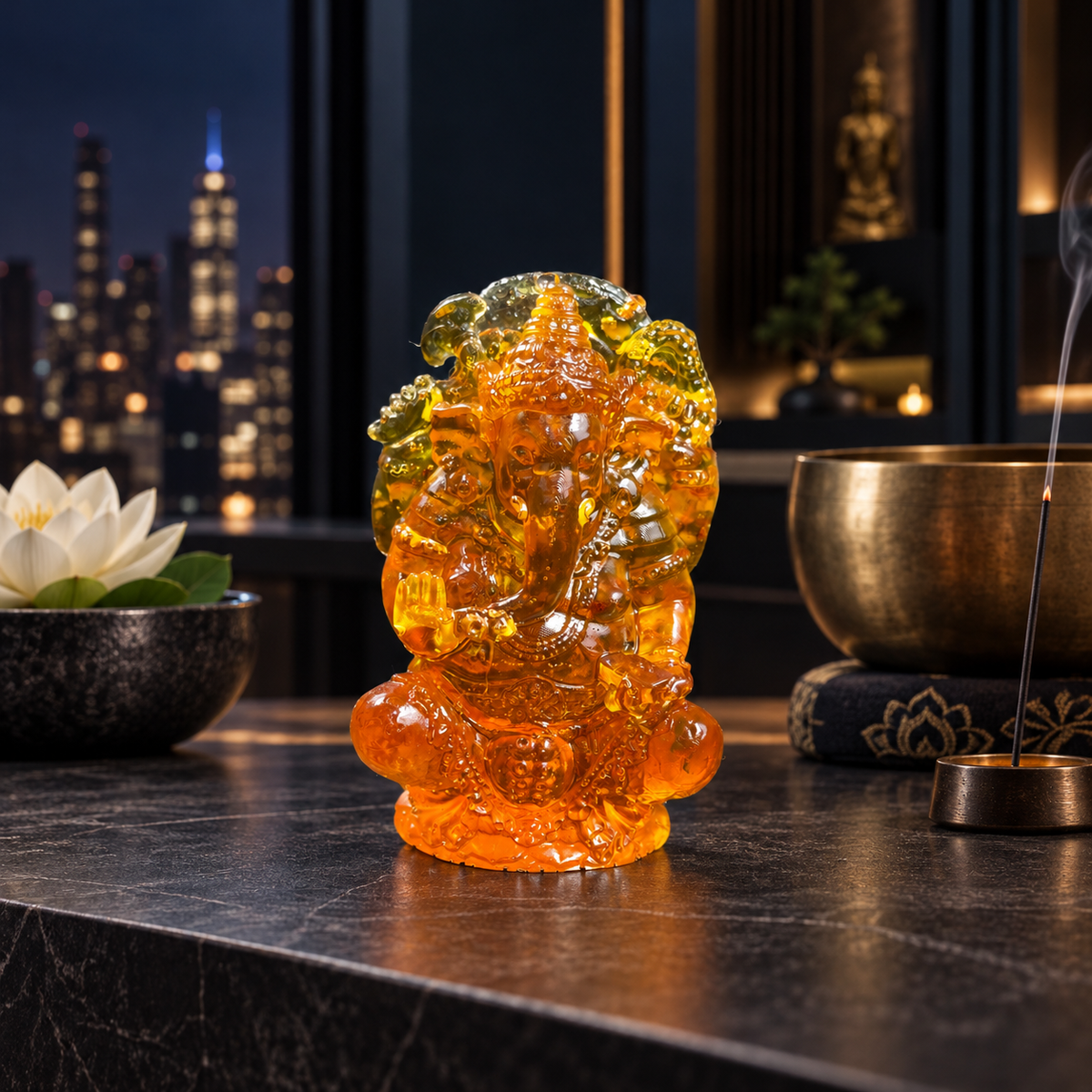 KIZIMA Baltic amber seated Ganesha statue, 8 cm, in a dark luxury meditation interior