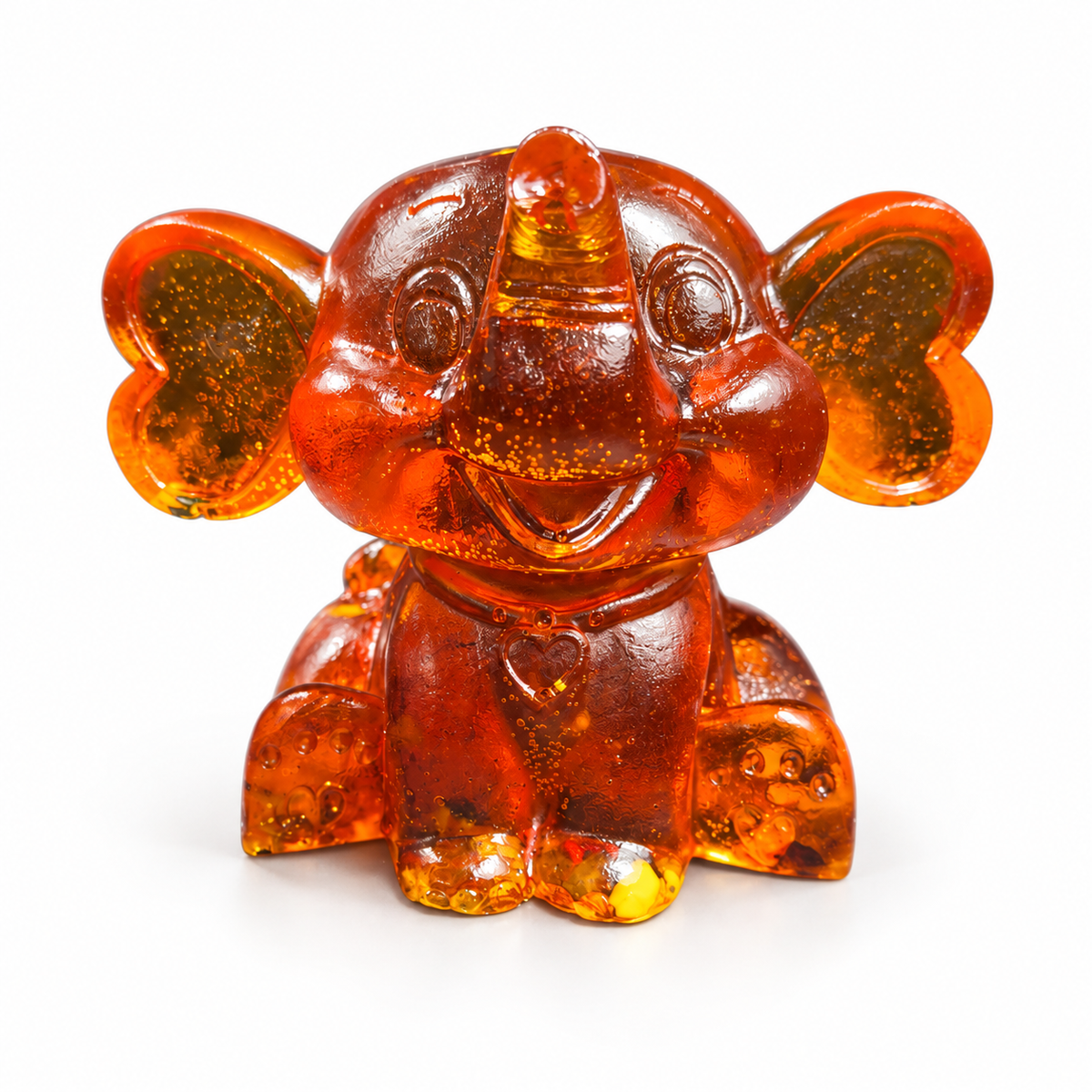 Natural Baltic Amber cartoon baby elephant figurine by KIZIMA®, white background — nursery and new baby gift
