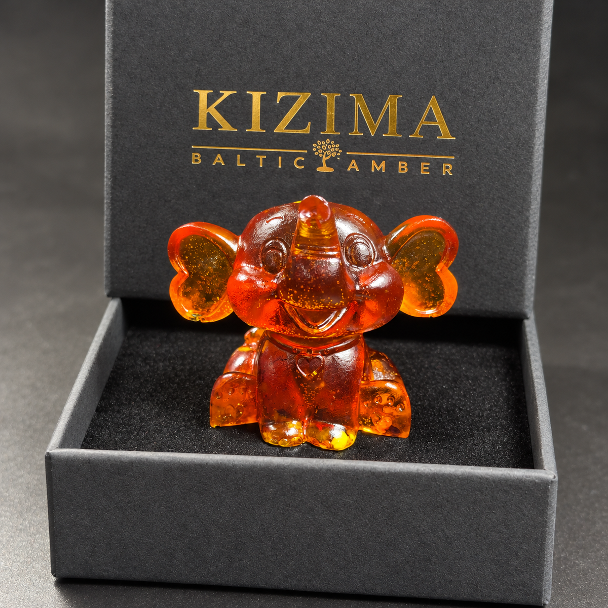 Baltic amber cartoon baby elephant figurine with KIZIMA® black gift box — ready-to-give elephant gift