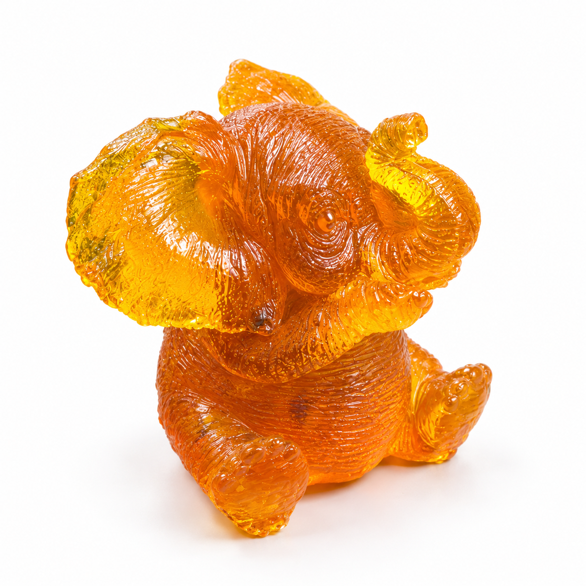 Natural Baltic Amber sitting baby elephant figurine by KIZIMA®, white background — cute elephant gift