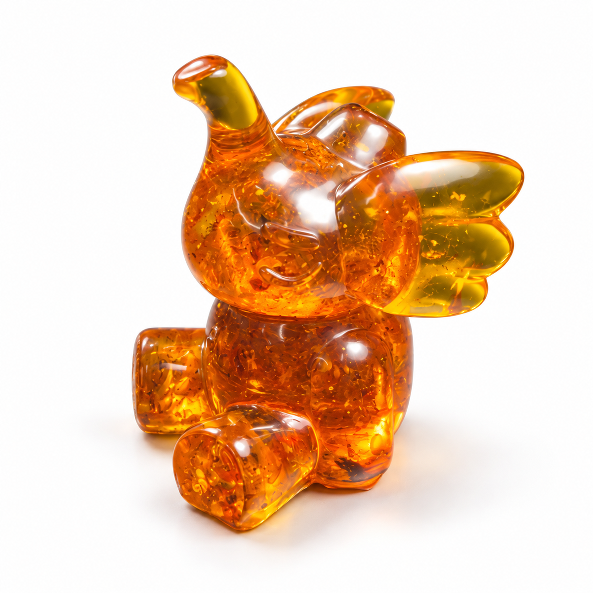 Natural Baltic Amber playful elephant figurine by KIZIMA®, white background — cute lucky elephant gift