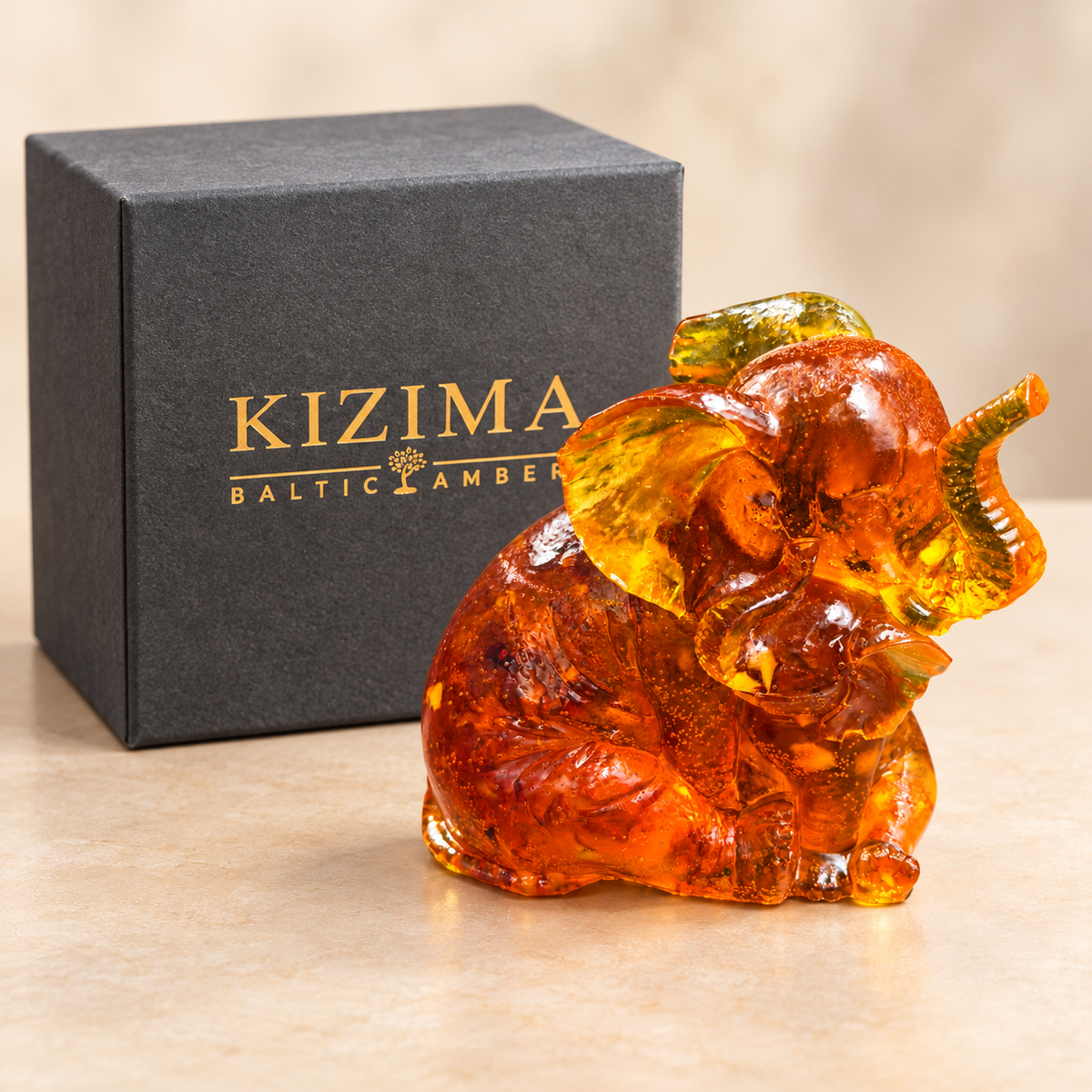 Baltic amber mother and baby elephant figurine with KIZIMA® black gift box — ready-to-give family gift
