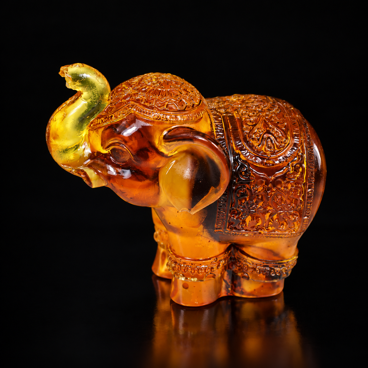 KIZIMA lucky Baltic amber elephant 11Elephantq36-6-3.5-5, raised trunk and ornate saddle on premium black studio background