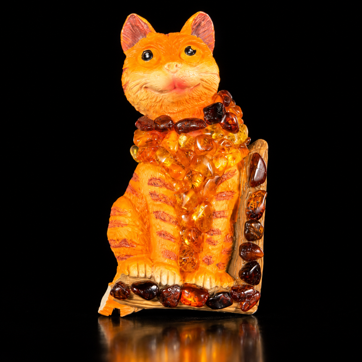 Made in USA Natural Baltic Amber cat fridge magnet by KIZIMA®, orange striped cat with real amber pieces, black studio background