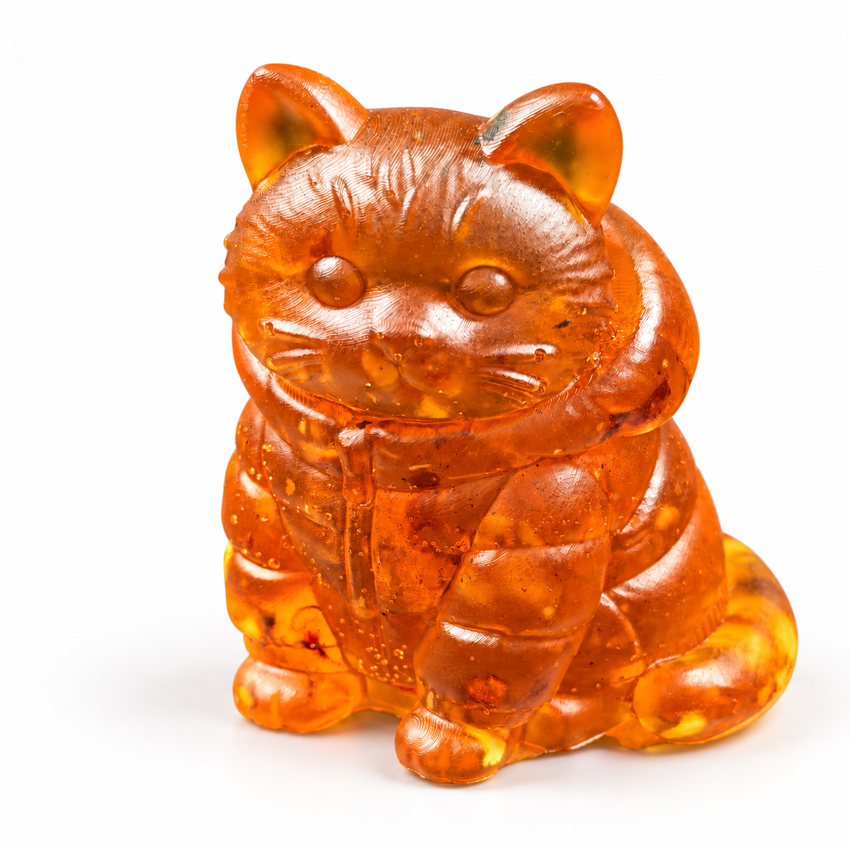 Made in USA Natural Baltic Amber hooded cat figurine by KIZIMA® showing the zipper and textured fur on white