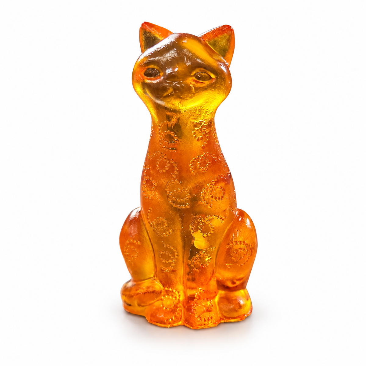 Made in USA Natural Baltic Amber sitting cat figurine by KIZIMA® with dotted paisley detail and upright ears on white