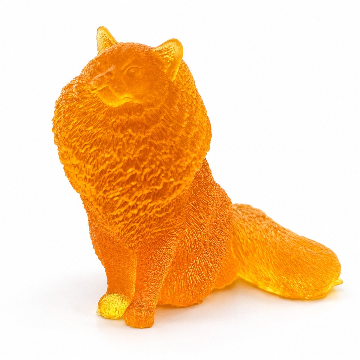 Made in USA Natural Baltic Amber fluffy cat figurine by KIZIMA®, honey-orange sitting cat with satin fur texture on white