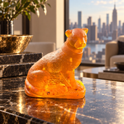 Made in USA Natural Baltic Amber panther figurine by KIZIMA®, 9 cm seated big cat with collar, on a dark marble console in a New York apartment