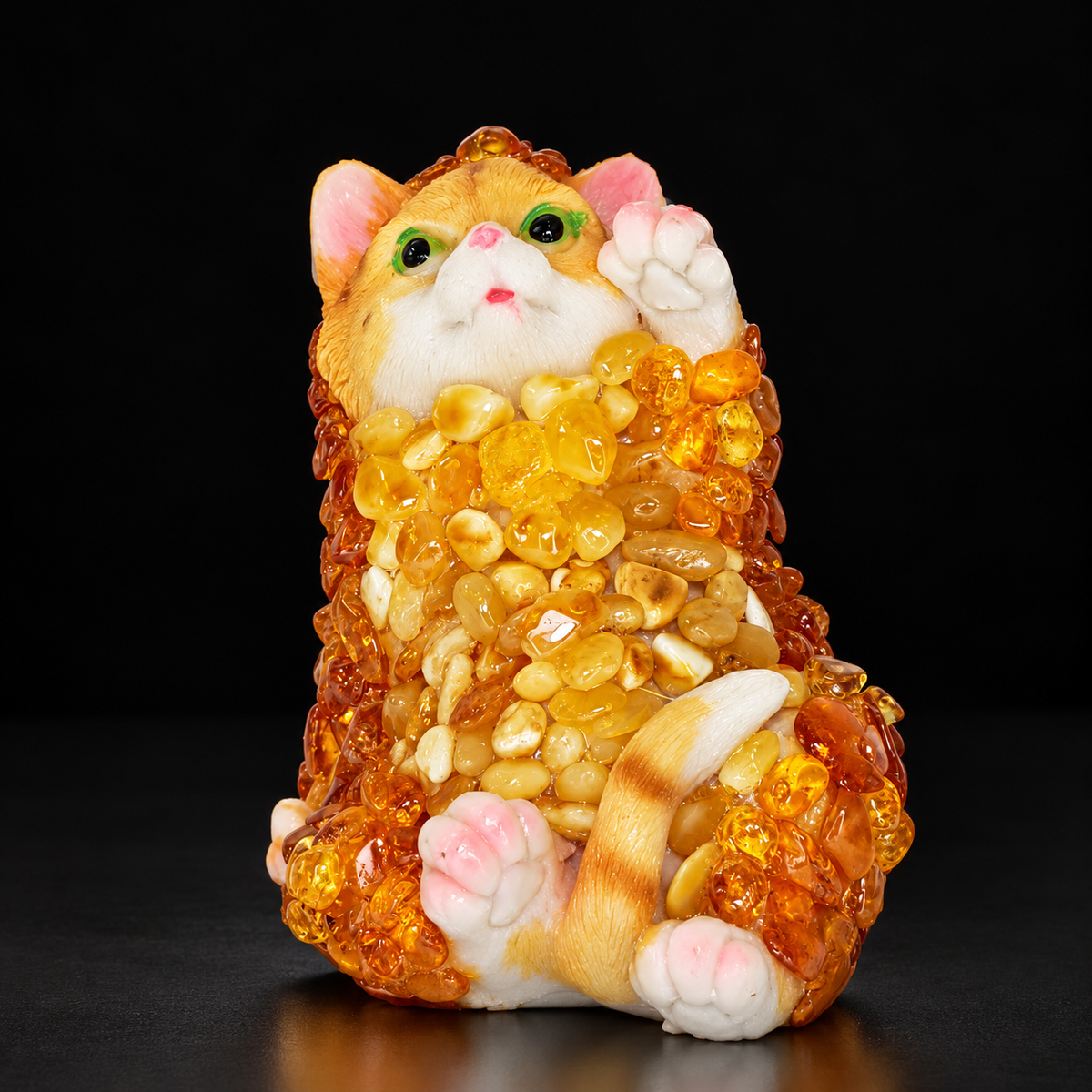 Natural Baltic Amber upright cat figurine by KIZIMA®, honey and cognac mosaic, black background, side view