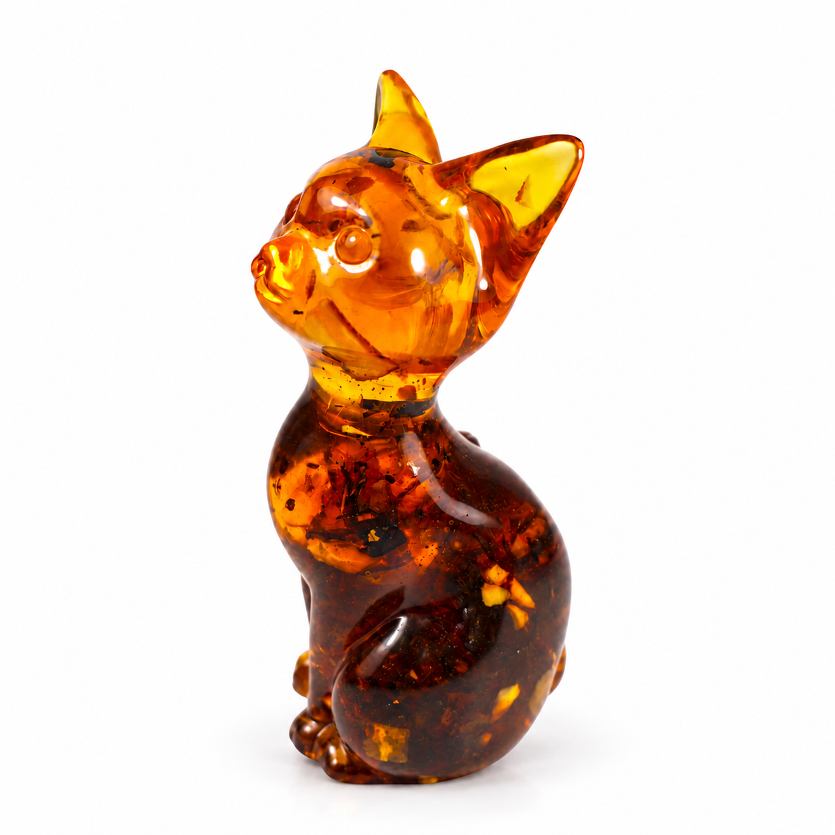 KIZIMA amber cat figurine on a white studio background
