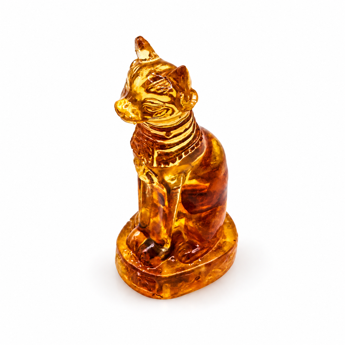 KIZIMA amber cat figurine on a white studio background