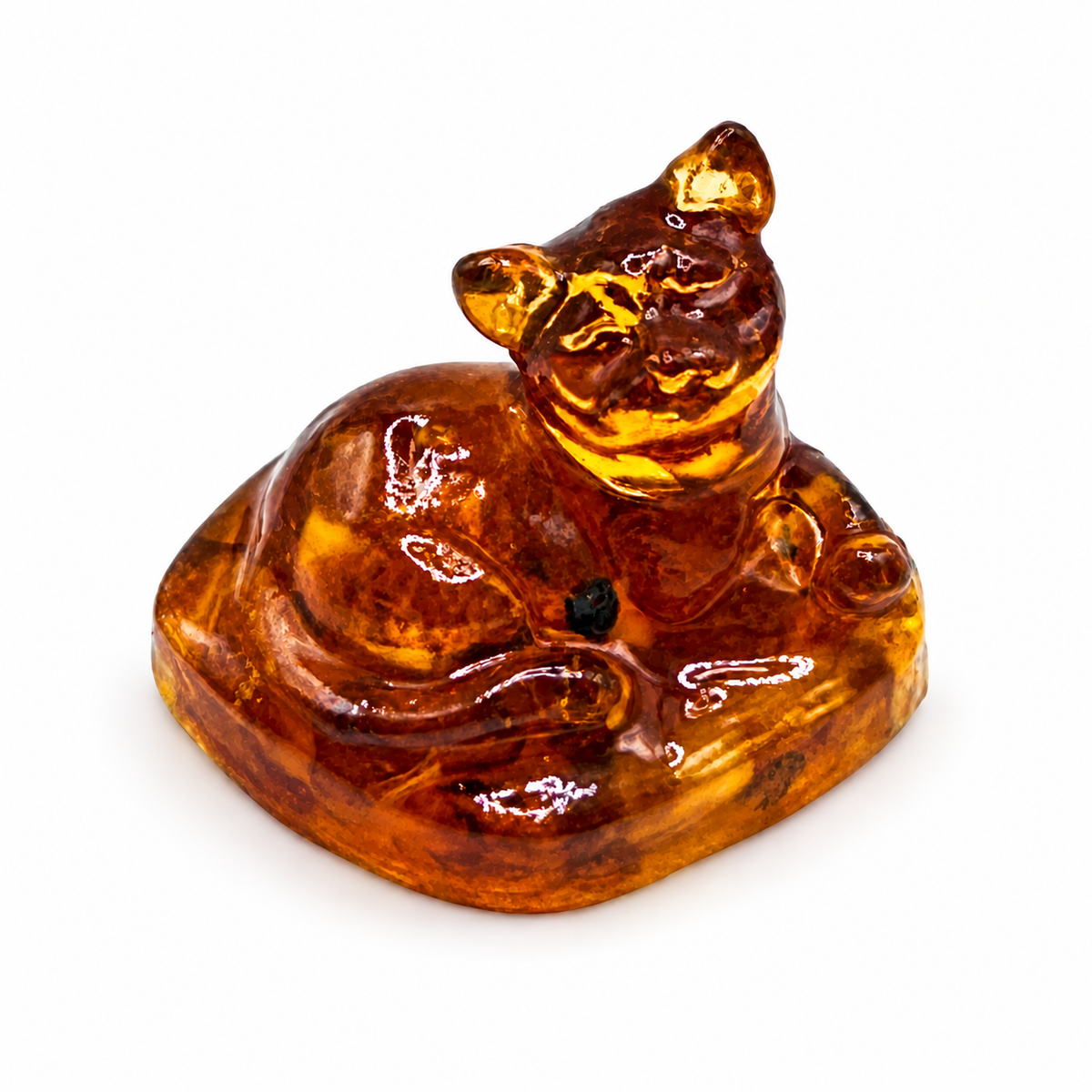 KIZIMA cat figurine on a white studio background