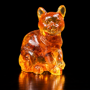 KIZIMA cat figurine on a black studio background, matching the current product reference
