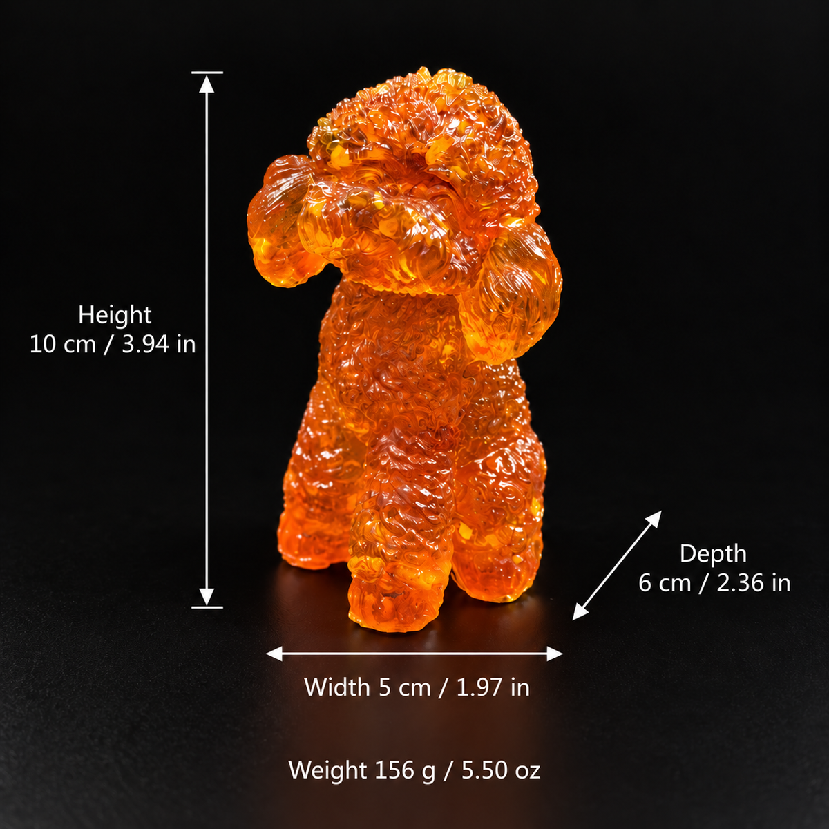 Amber poodle size chart on black: height 10 cm (3.94 in), depth 6 cm (2.36 in), width 5 cm (1.97 in); weight 156 g (5.50 oz).