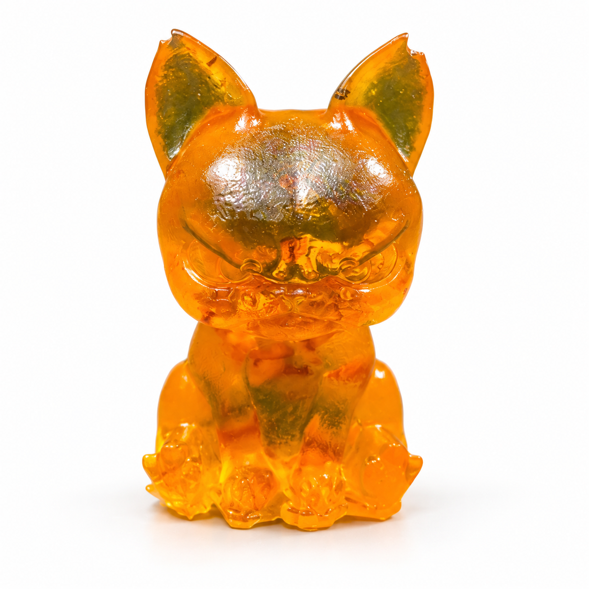 Seated cartoon bulldog figurine on white, showing pointed amber ears, a broad muzzle and dark shading across its furrowed forehead.
