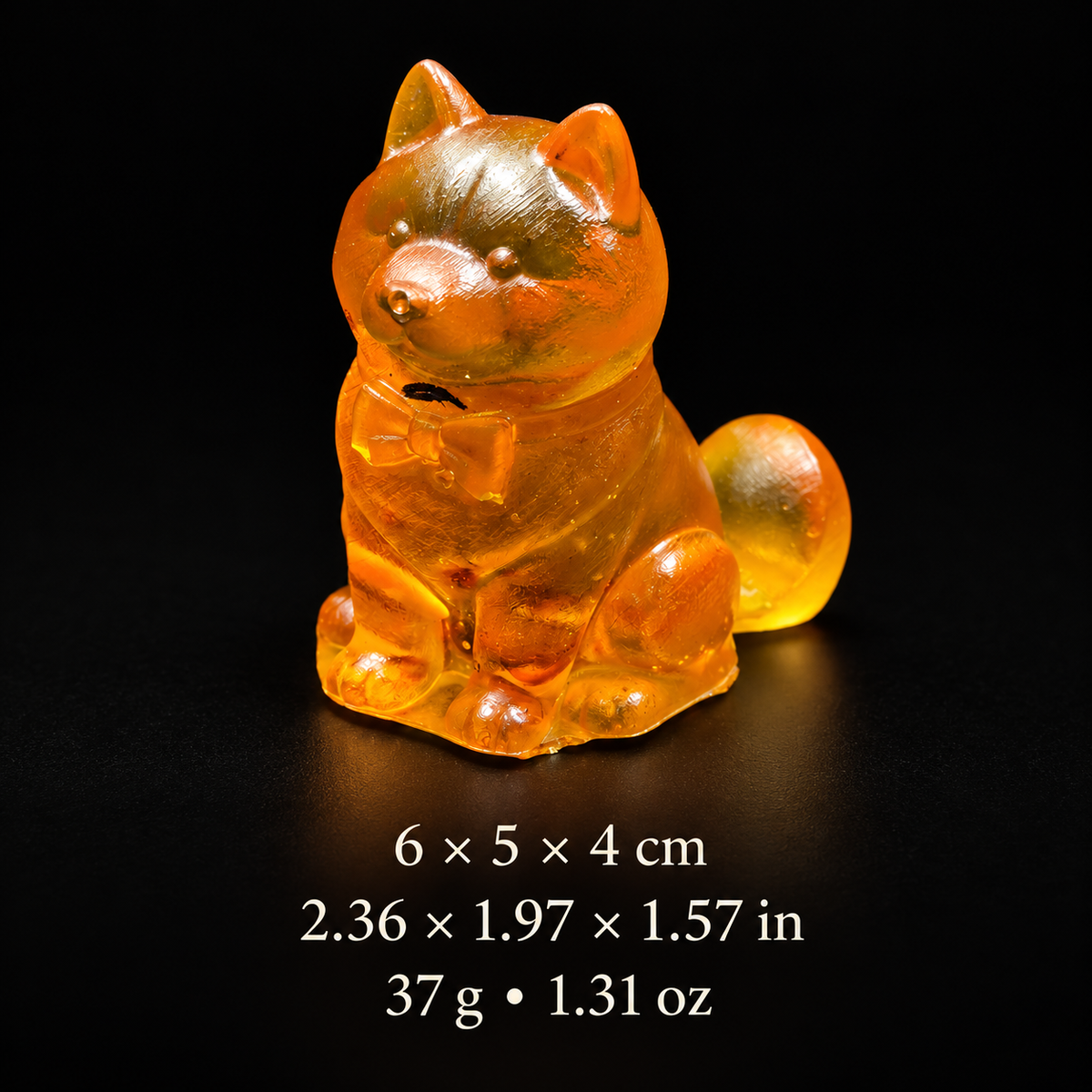 Puppy with bow size chart: 6 × 5 × 4 cm (2.36 × 1.97 × 1.57 in), weight 37 g (1.31 oz), below the amber figurine.