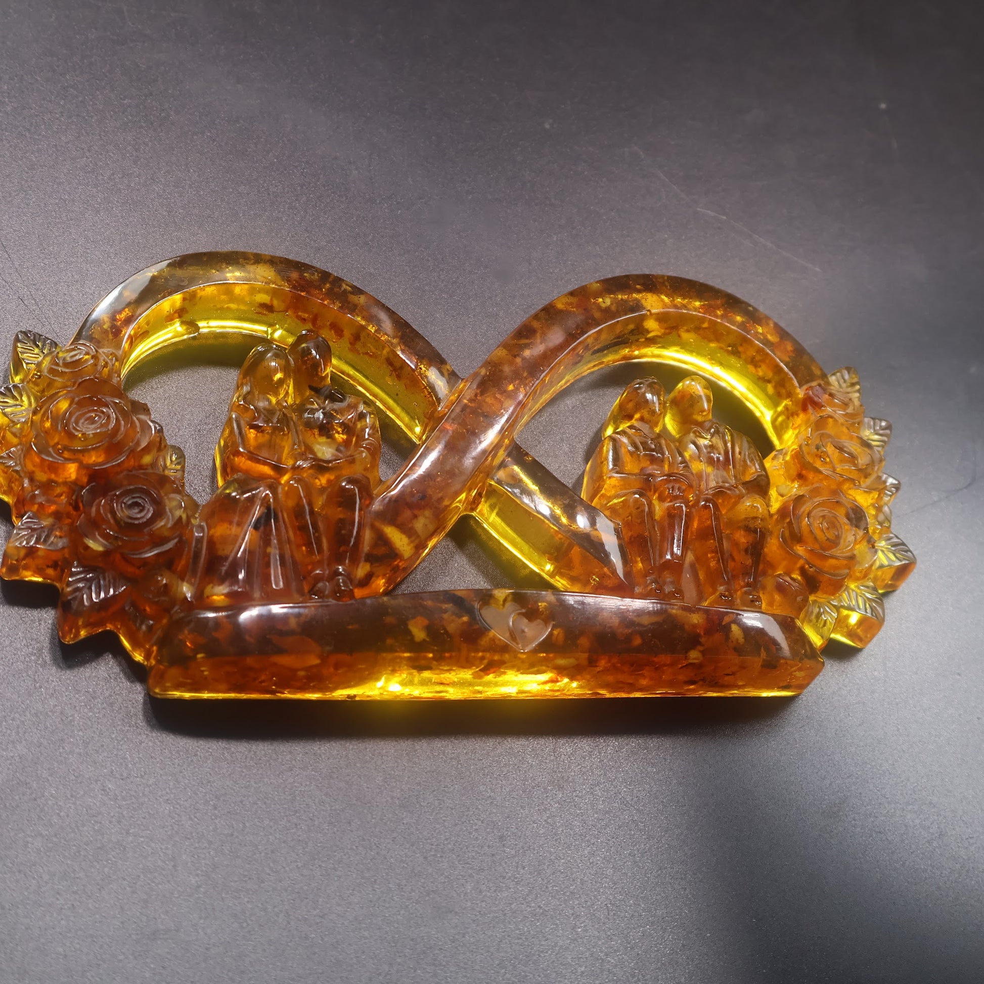 Made in USA KIZIMA natural Baltic amber infinity love sculpture with young wedding couple and grandparents