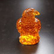KIZIMA® anniversary eagle Baltic amber statue — genuine amber decor, handmade in USA, detail view