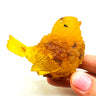 Yellow Baltic amber bird figurine, handmade by KIZIMA New York