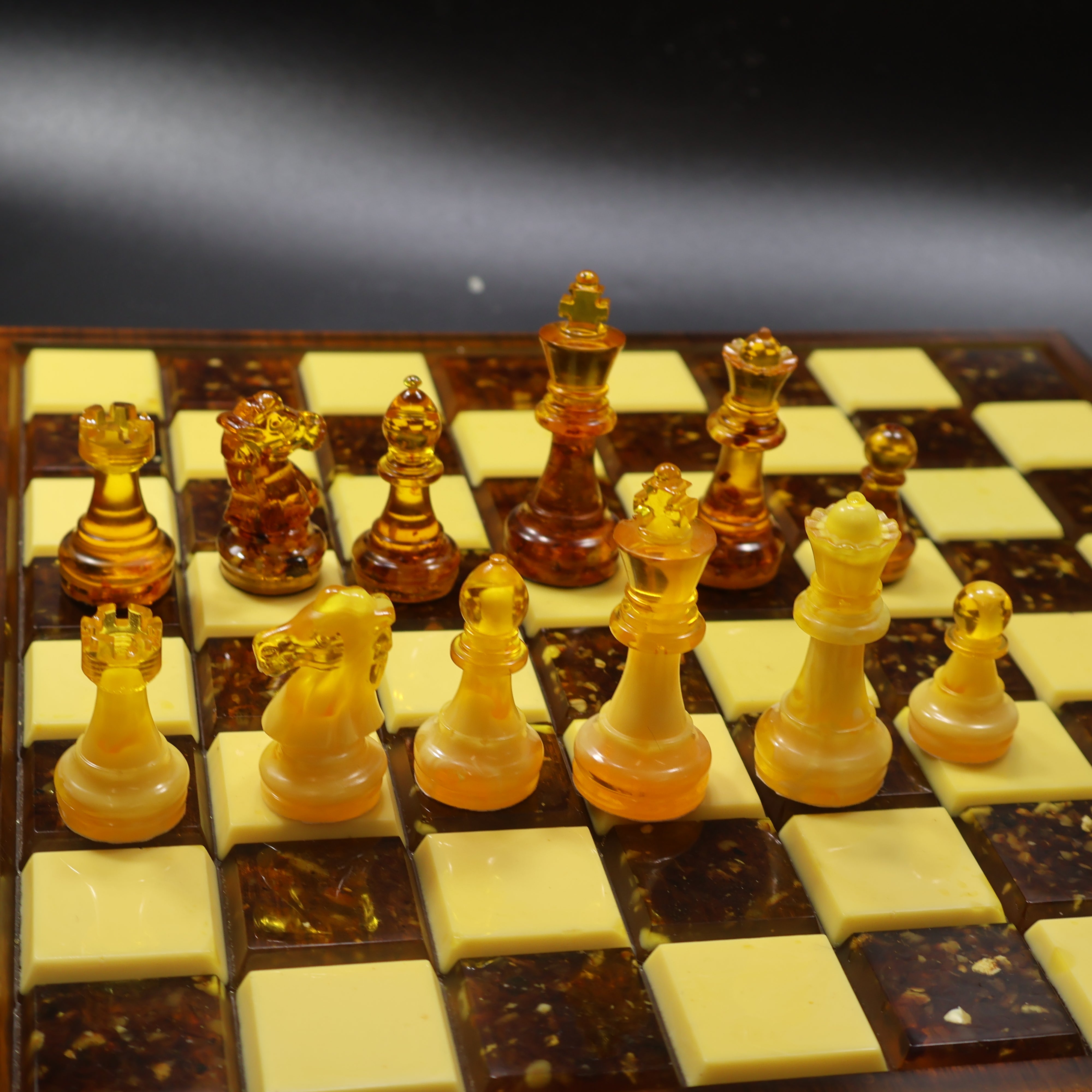 Baltic amber chess pieces honey and cognac tones on rattan wood inlaid board, handcrafted luxury chess set KIZIMA New York
