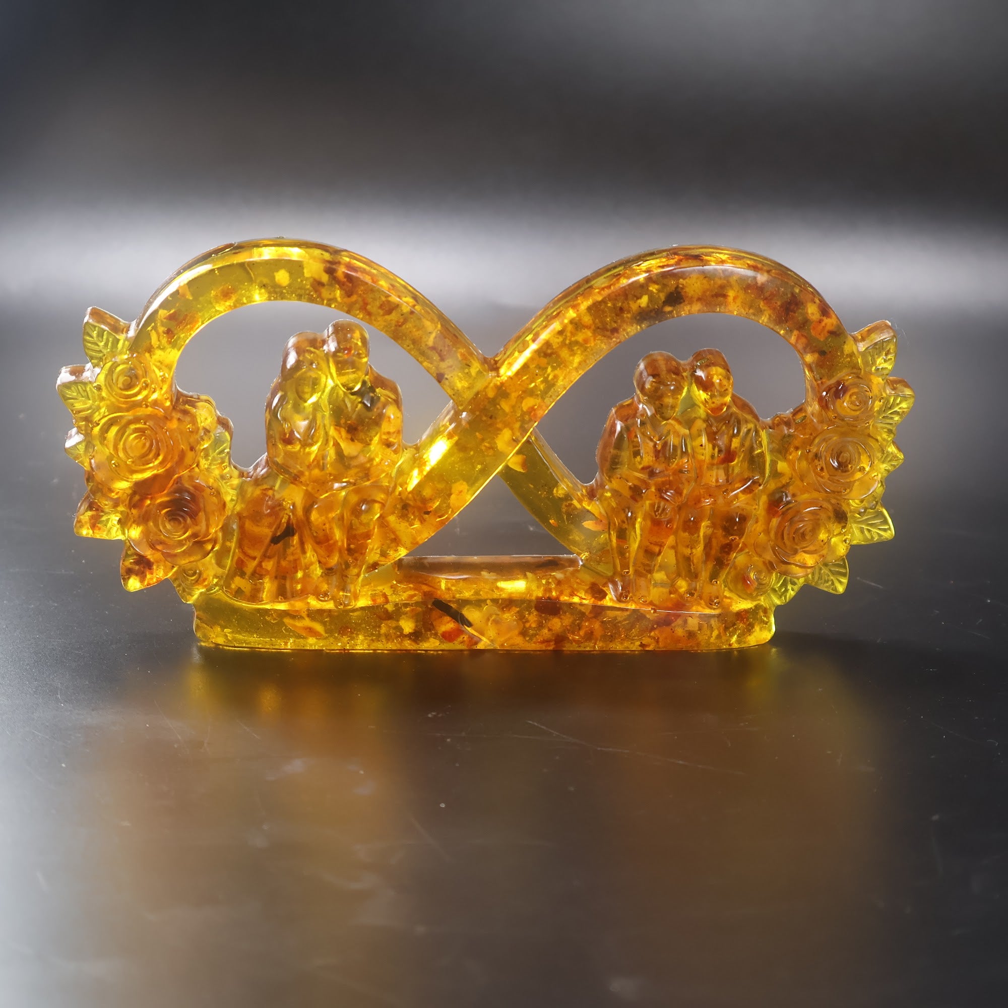 Made in USA KIZIMA natural Baltic amber infinity love sculpture with young wedding couple and grandparents