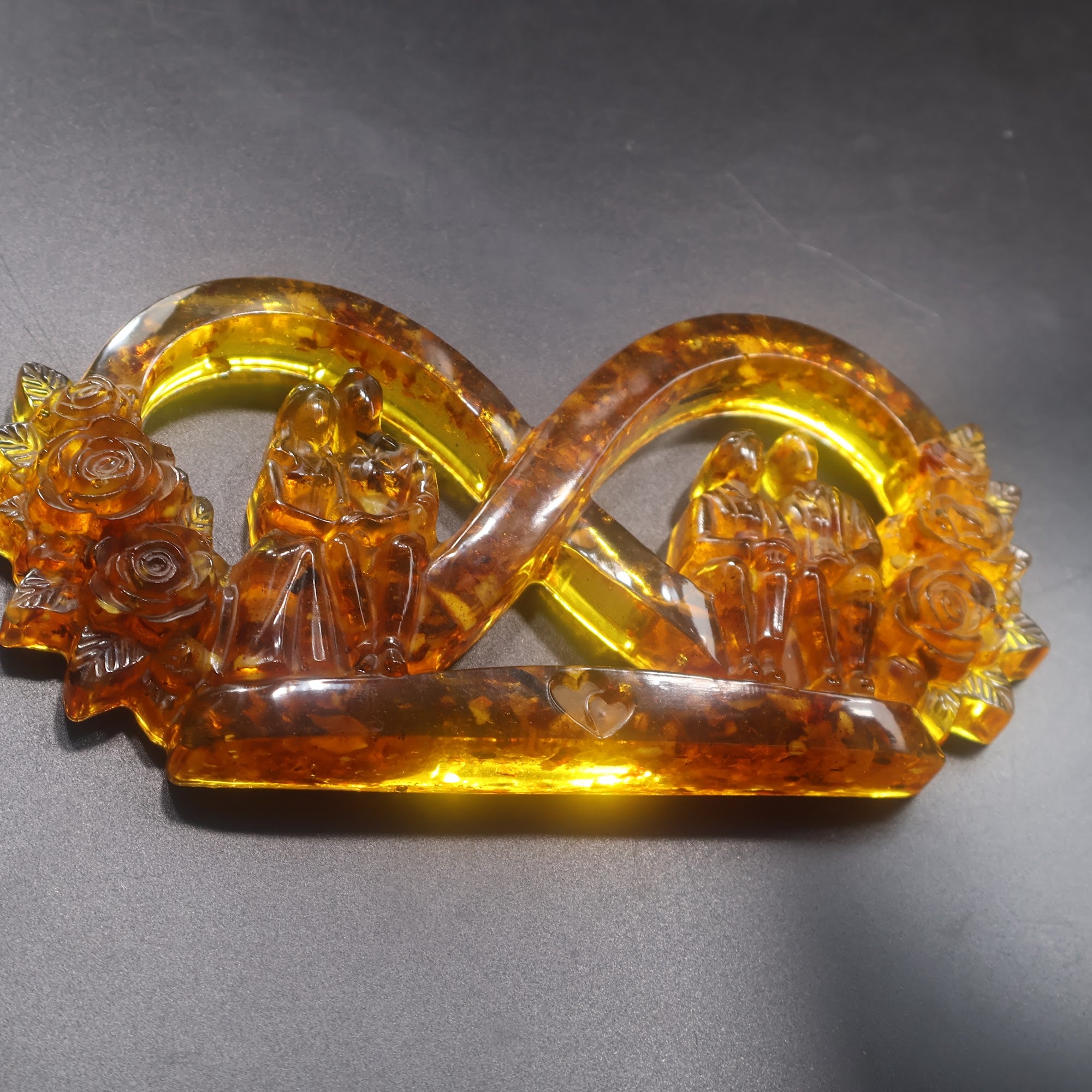 Made in USA KIZIMA natural Baltic amber infinity love sculpture with young wedding couple and grandparents