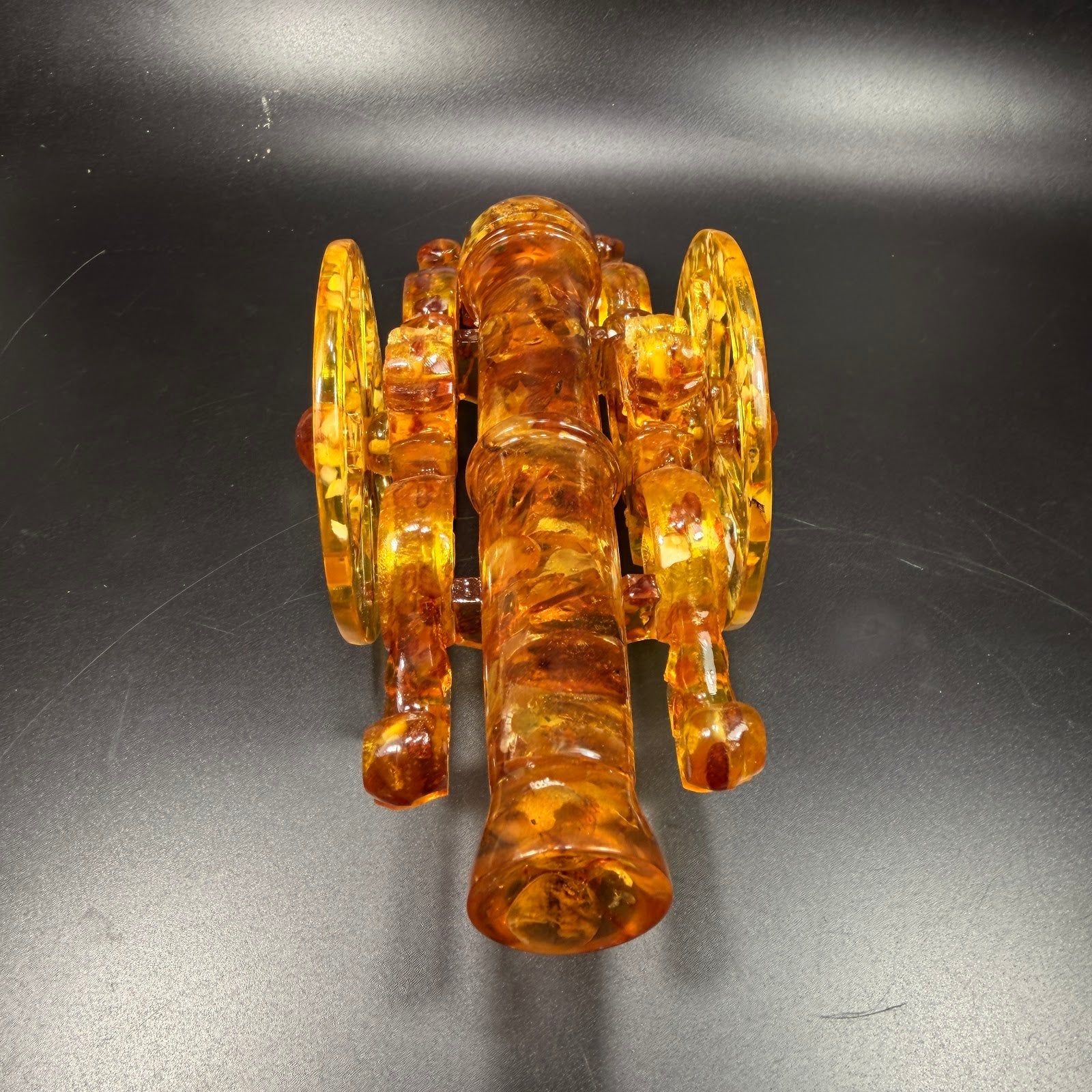 KIZIMA Baltic amber cannon sculpture detail — handmade collectible desk decor, USA