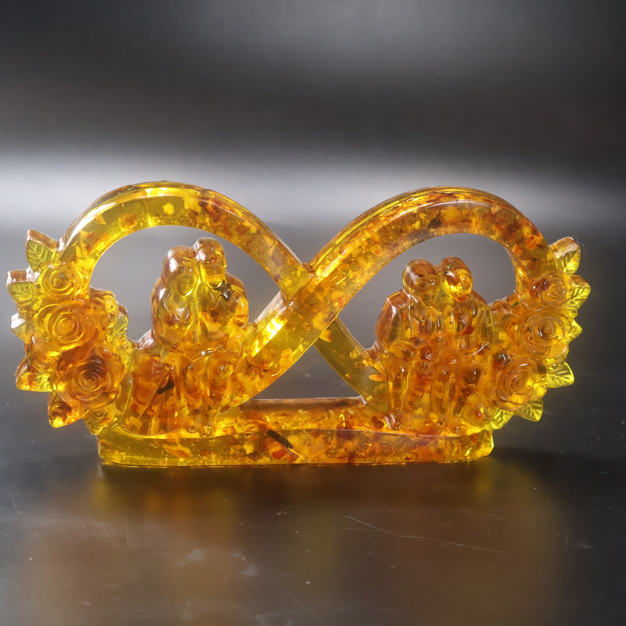 Made in USA KIZIMA natural Baltic amber infinity love sculpture with young wedding couple and grandparents