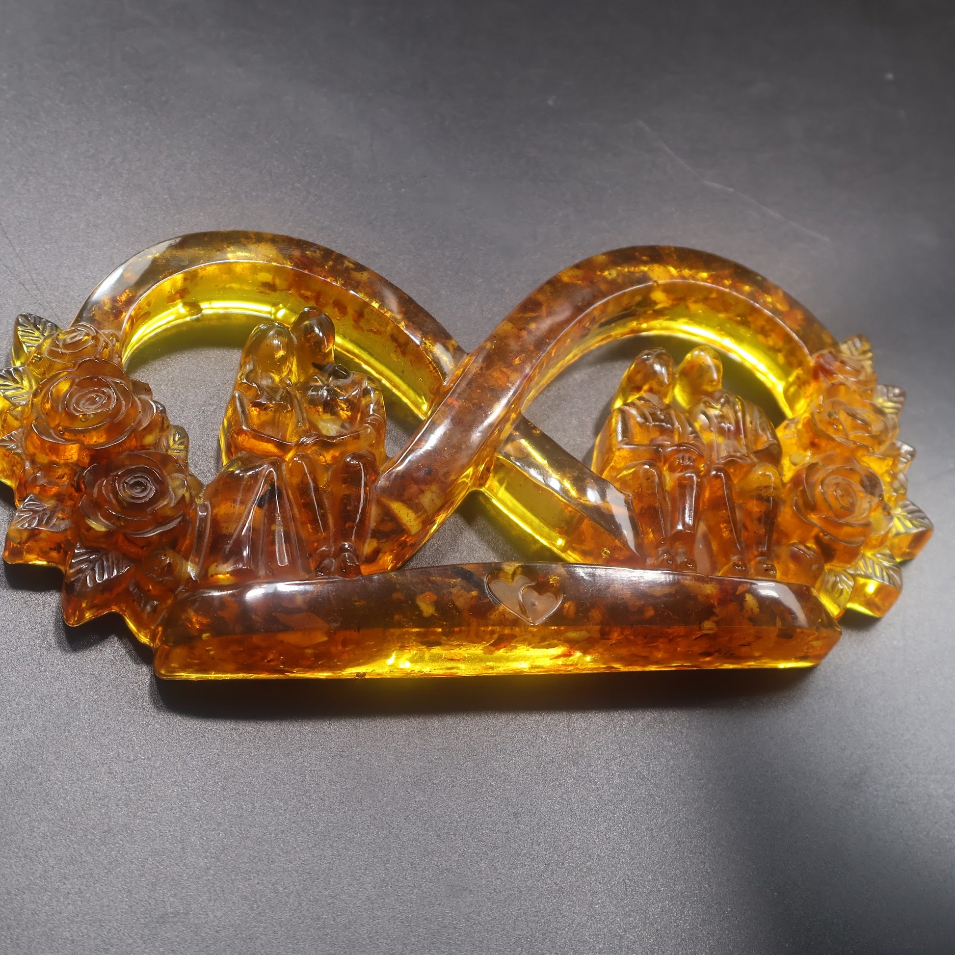 Made in USA KIZIMA natural Baltic amber infinity love sculpture with young wedding couple and grandparents