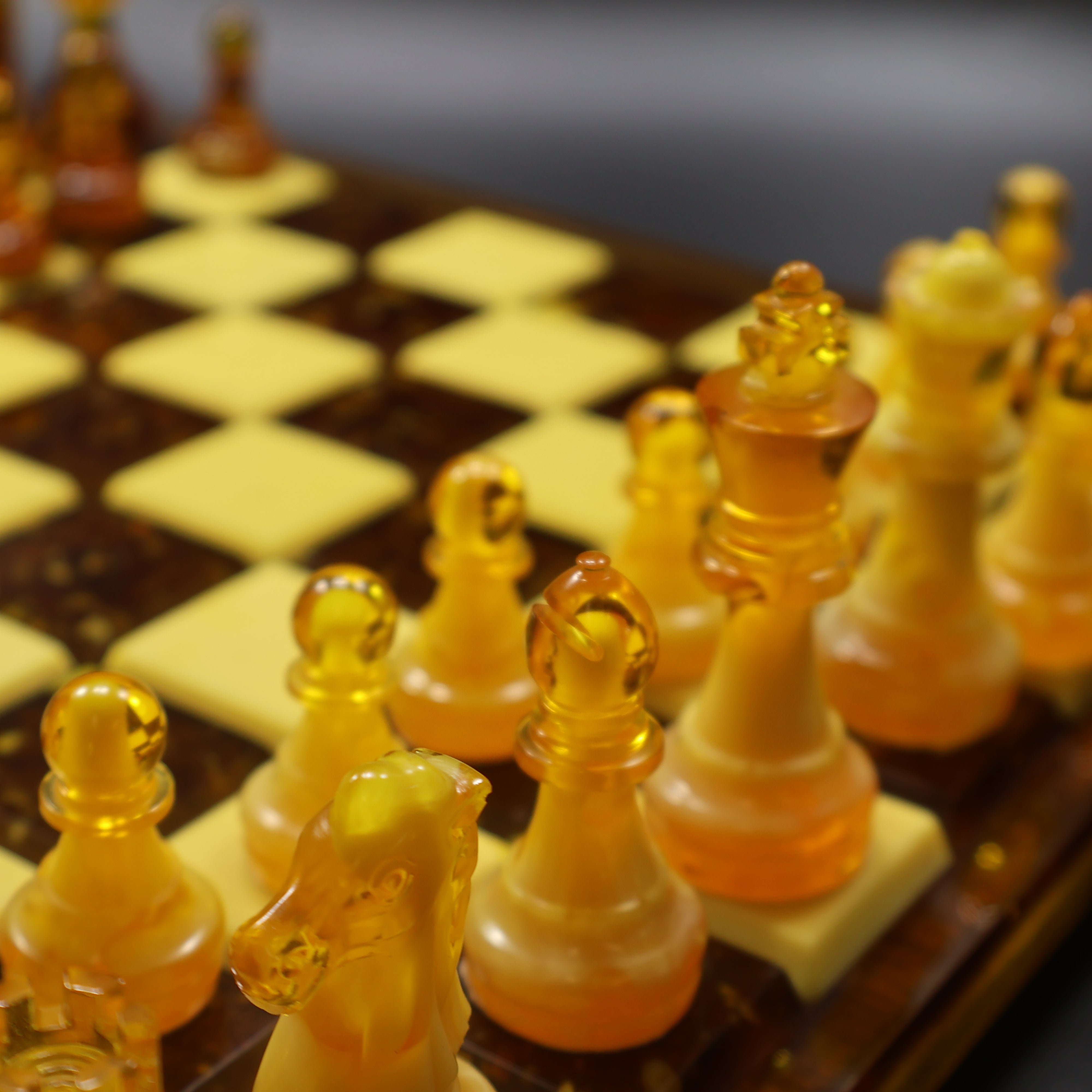 Handmade Baltic amber chess set pieces on rattan wood inlaid board, natural amber pawns knights and rooks, made in USA KIZIMA