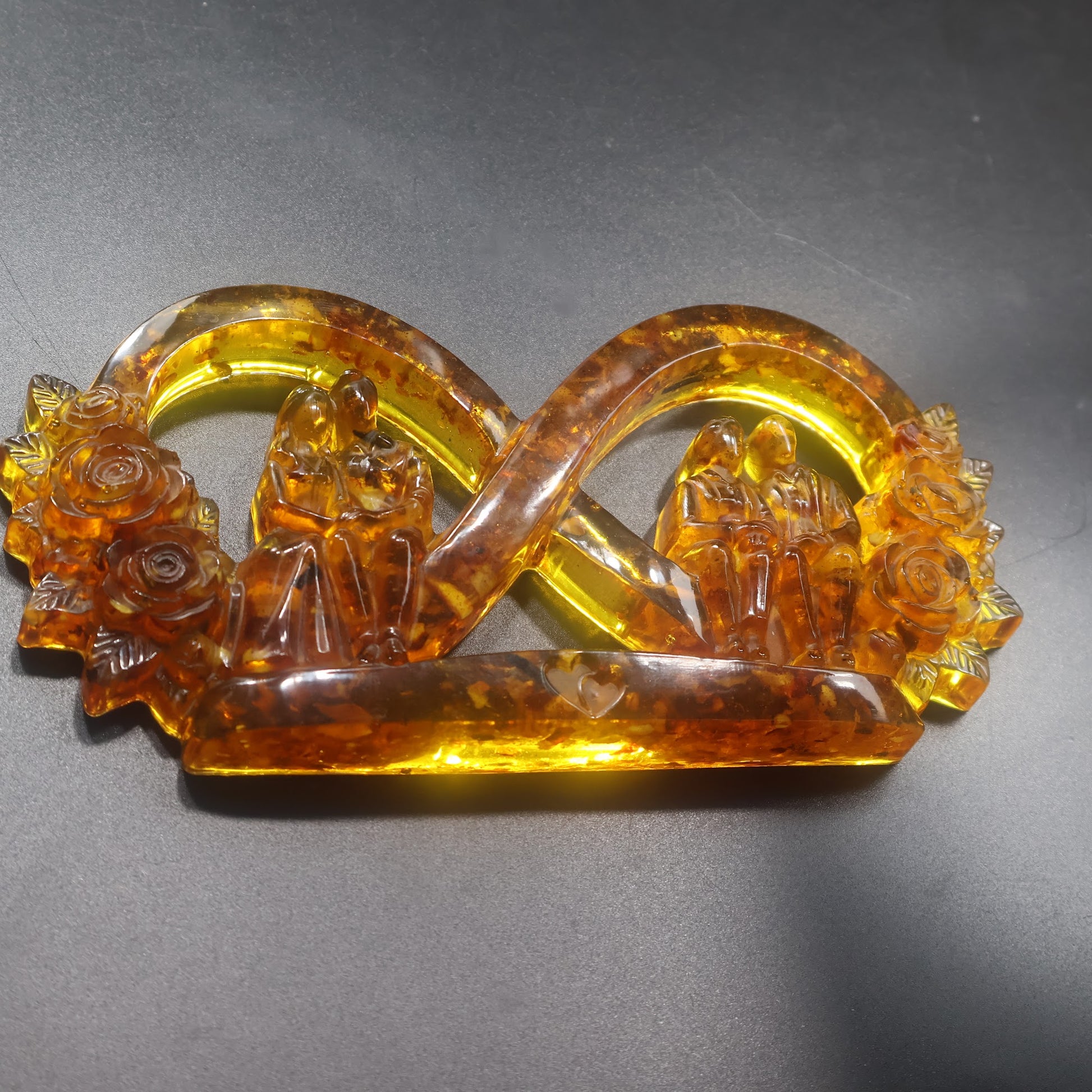 Made in USA KIZIMA natural Baltic amber infinity love sculpture with young wedding couple and grandparents