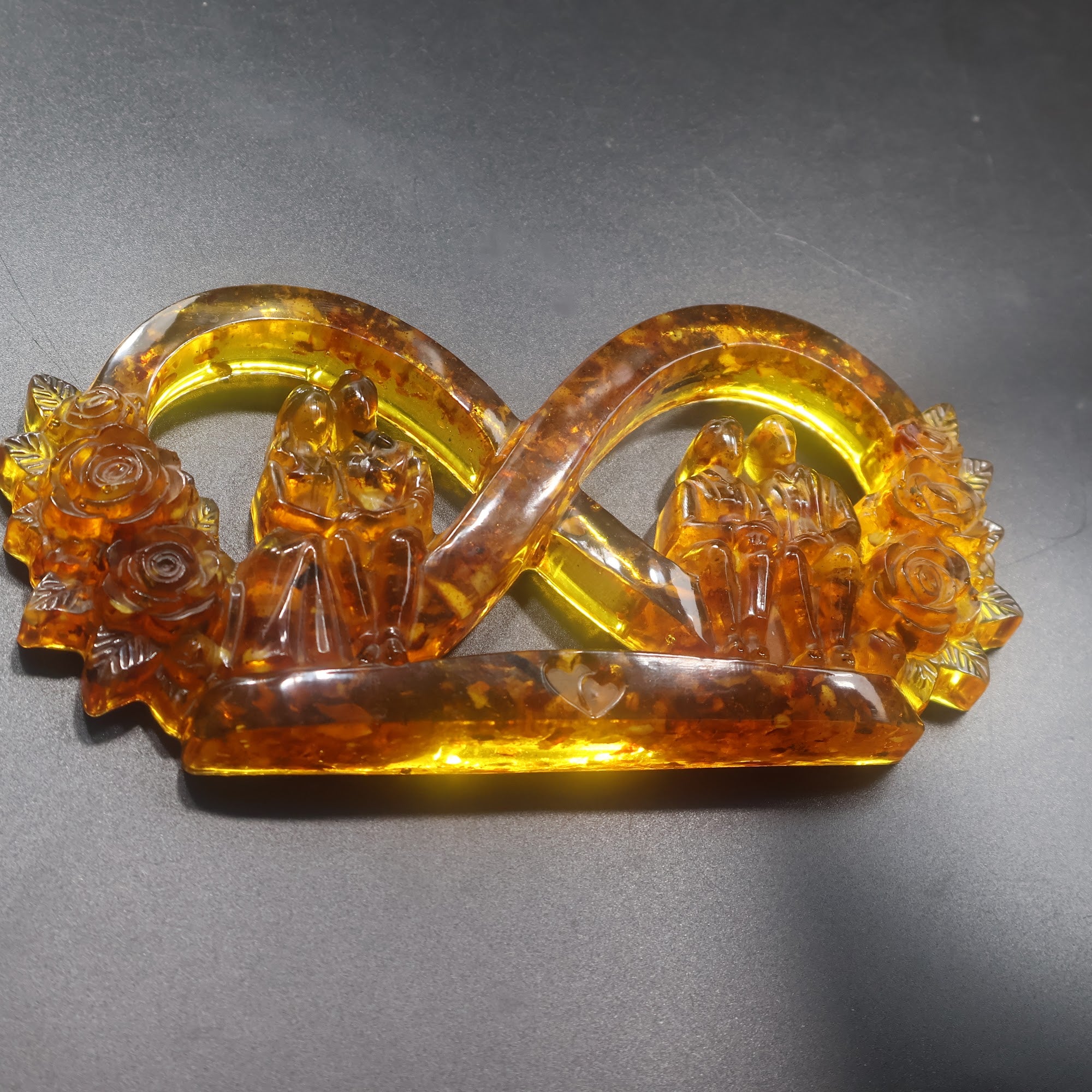 Made in USA KIZIMA natural Baltic amber infinity love sculpture with young wedding couple and grandparents
