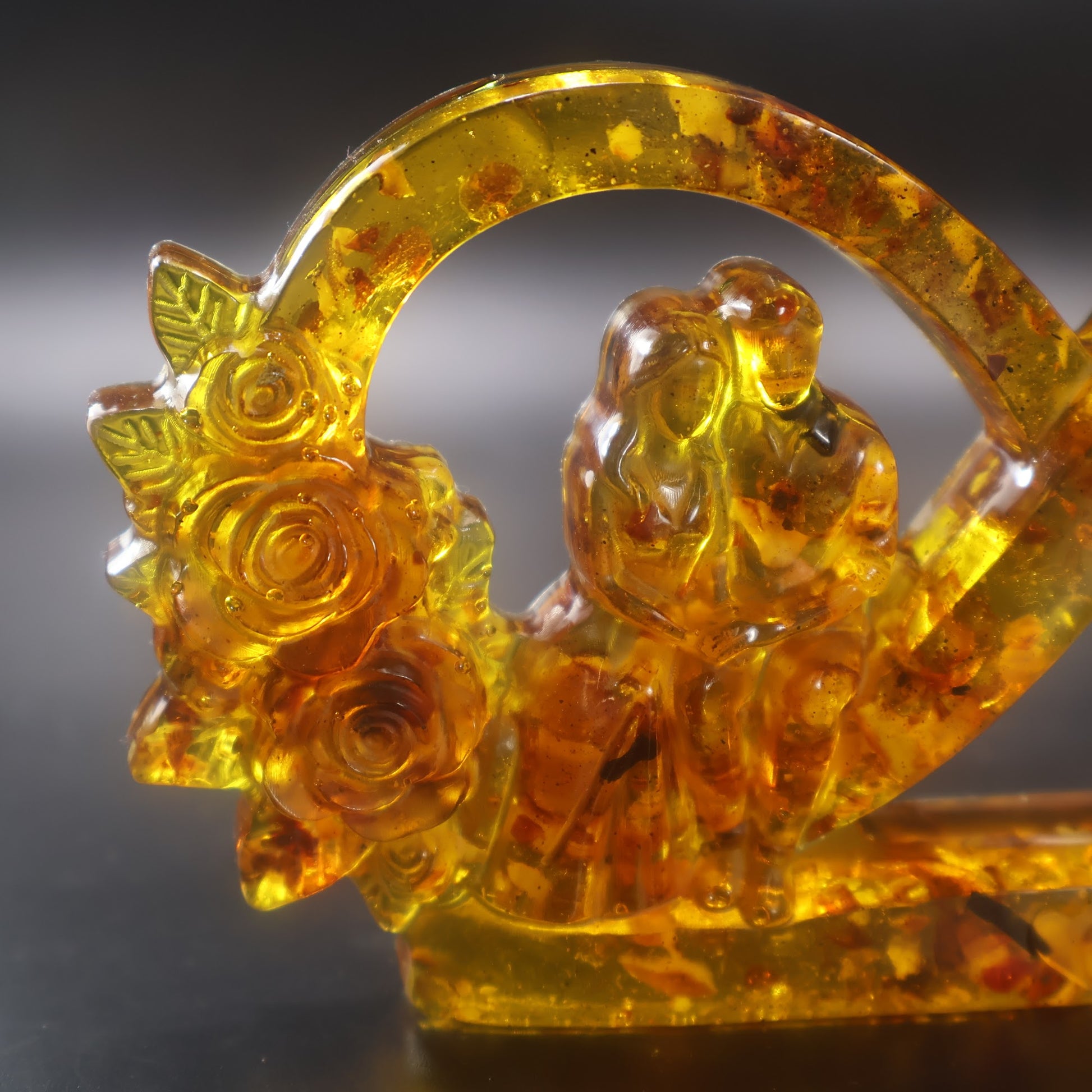 Made in USA KIZIMA natural Baltic amber infinity love sculpture with young wedding couple and grandparents