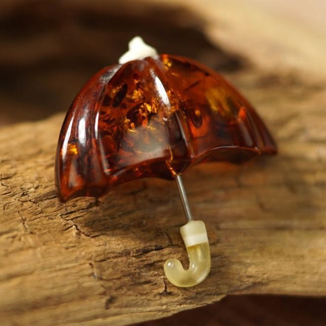 Handmade Baltic amber umbrella brooch by KIZIMA® — natural amber jewelry, made in USA