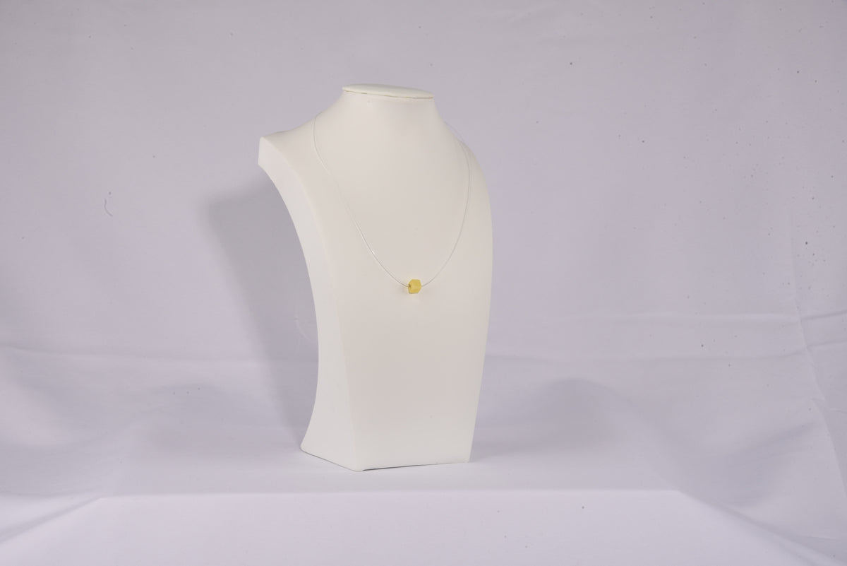 Original camera photograph of KIZIMA 2G0050q0.52-2 amber jewelry on its real background