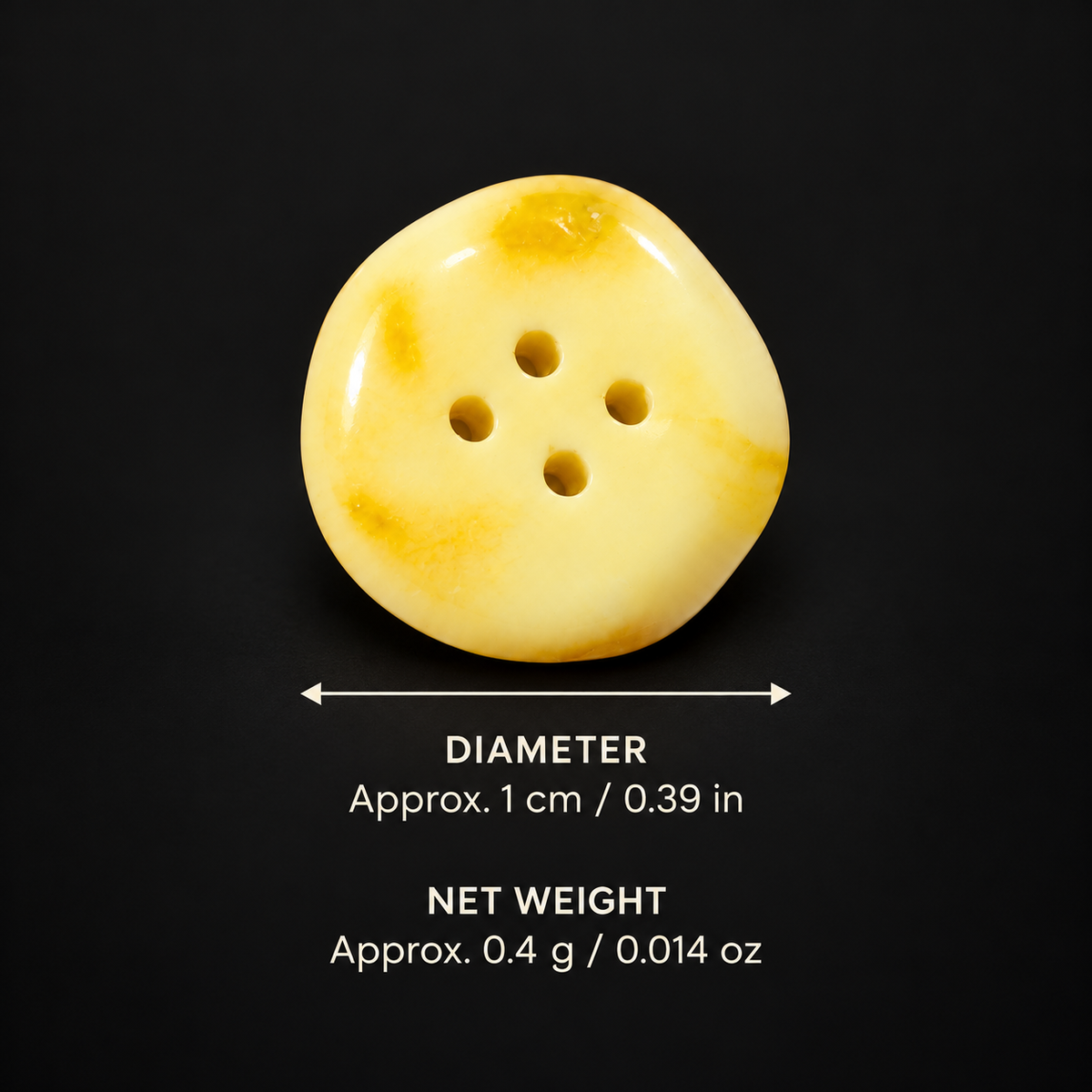 Natural Baltic amber four-hole button on a dark studio background with diameter approximately 1 cm (0.39 in) and net weight approximately 0.4 g (0.014 oz); one random-color button sold individually.