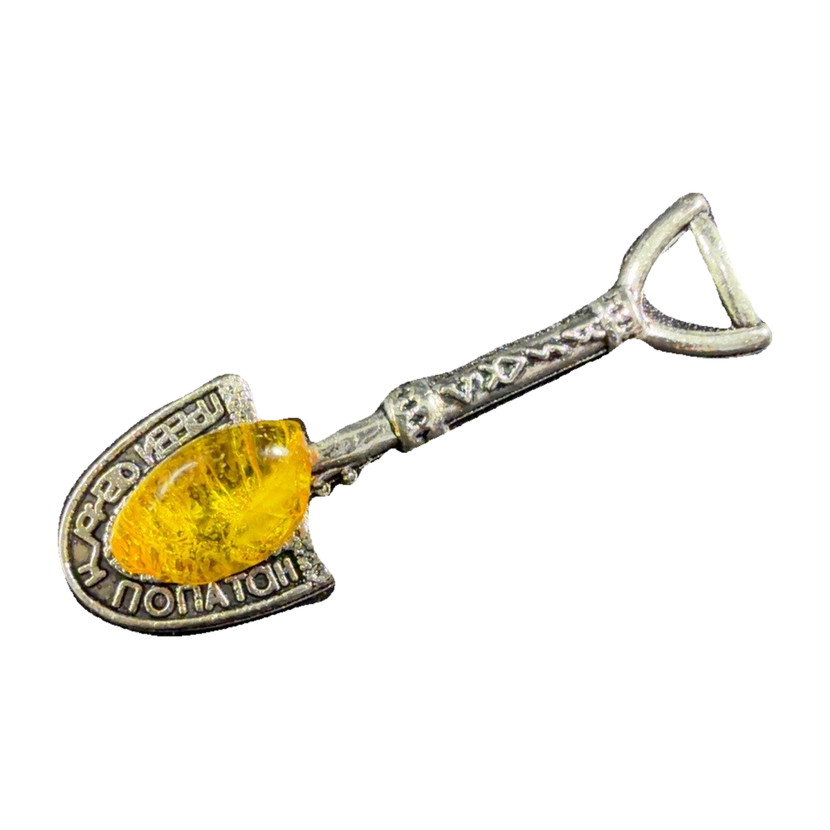 31SHOVEL01Q1.2 amber shovel on pure white background