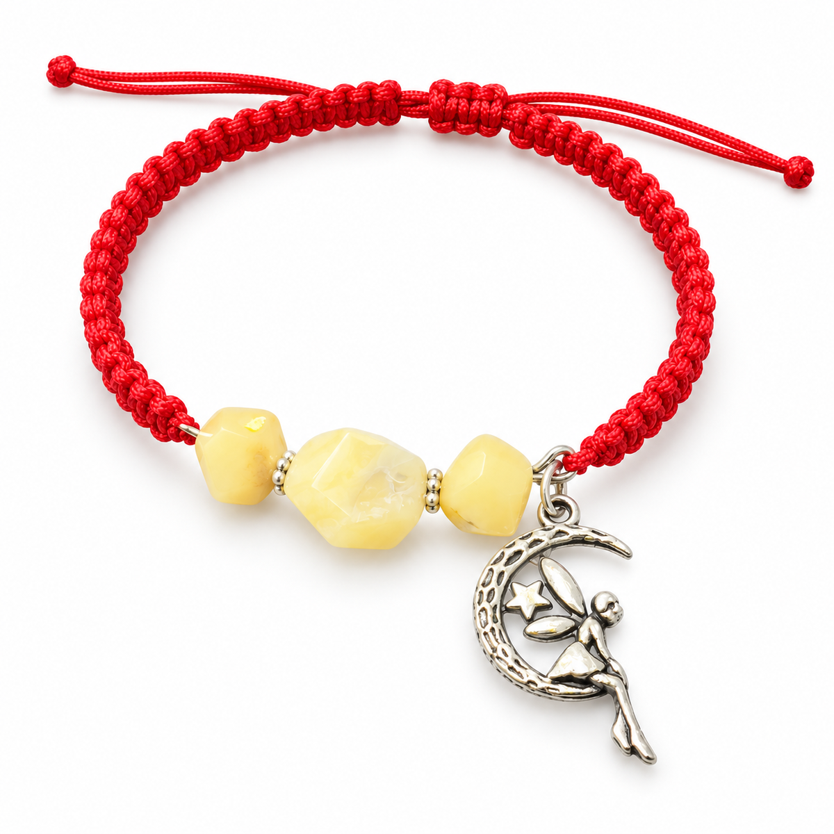 KIZIMA yellow matte amber red macrame bracelet with crescent moon and fairy charm on a white background.