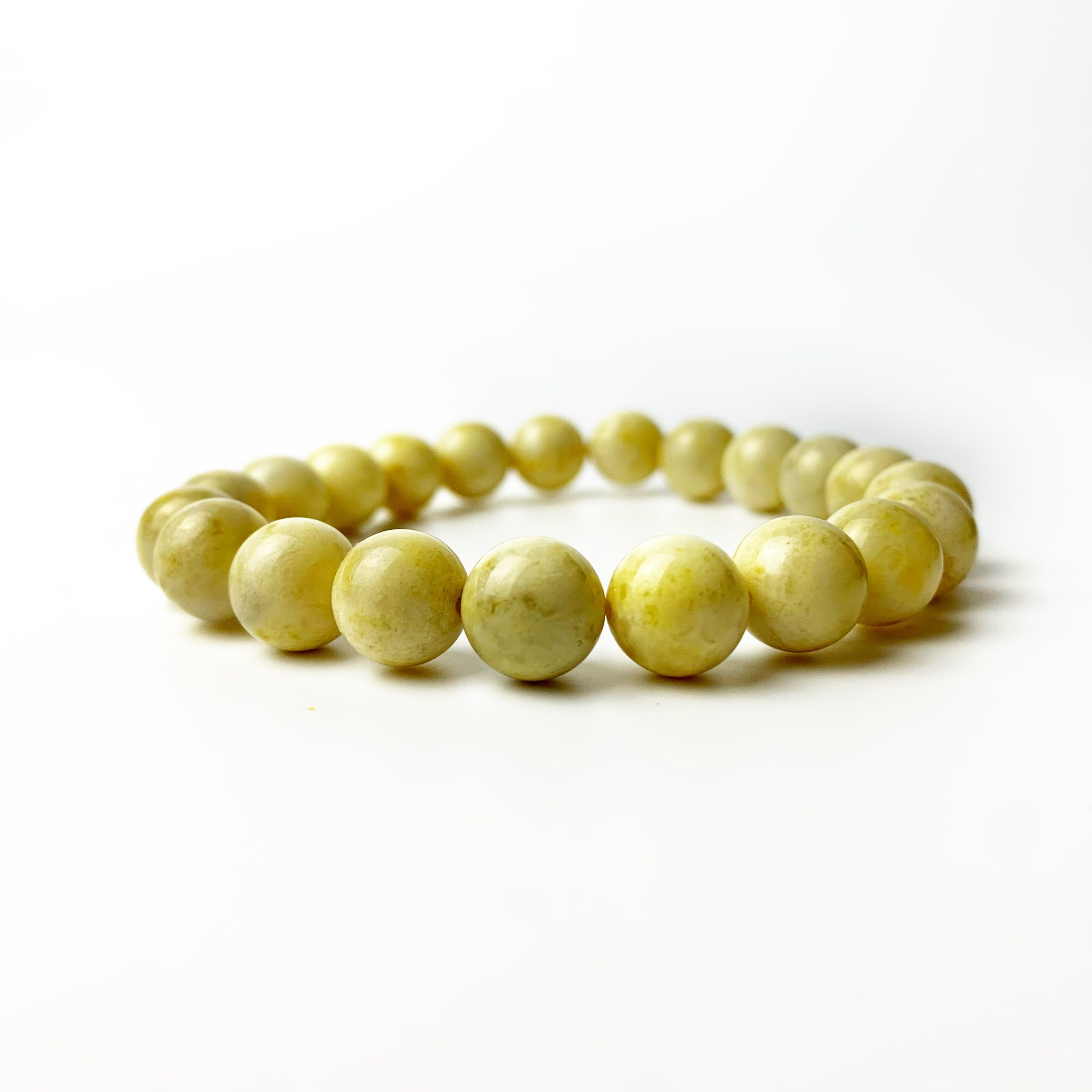 Bracelet en ambre de la Baltique fait main USA KIZIMA blanc
